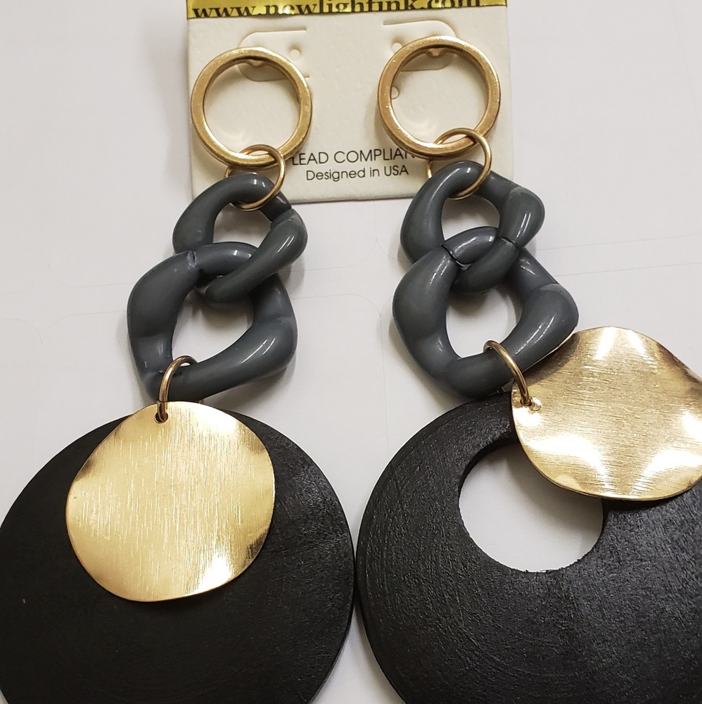 Earrings by: New light ink apparel and accessories